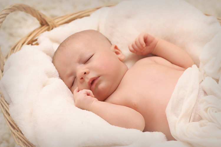 Image of baby lying asleep